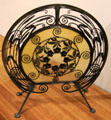 Art Nouveau wrought iron fireplace screen by Adalbert-Georges Szabo at Petit Palace Museum. Paris, France.