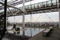 Sculptures on external pool on upper deck with glass tunnel walkway at Georges Pompidou Center. Paris, France.
