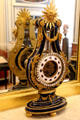 Bronze & Sèvres blue porcelain mantle clock in shape of lyre attrib. Pierre Gouthière at Cognacq-Jay Museum. Paris, France.