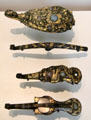 Silvered bronze clothing hooks from northern China at Guimet Museum. Paris, France.