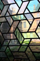 Courtyard seen through window panes at Carnavalet Museum. Paris, France