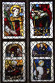 Stained glass window with religious themes at Carnavalet Museum. Paris, France.