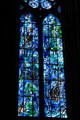 Virgin Mary above scenes of David, Solomon, Saul & Jesse Tree on Chagall stained glass window at Reims Cathedral. Reims, France.