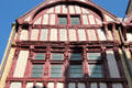 Carving detail of facade on half-timbered house on St-Pierre Street. Caen, France.