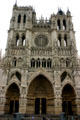 West front facade & main portal of Amiens Cathedral. Amiens, France.