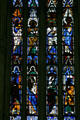Saints under north transept rose window at Amiens Cathedral. Amiens, France.