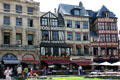 Half-timbered heritage buildings around market. Rouen, France.