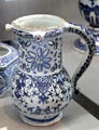 Earthenware puzzle jug with blue foliage from Rouen at Rouen Ceramic Museum. Rouen, France.