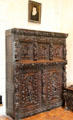 Renaissance carved wardrobe close with upper panels showing faith, hope & charity flanked by seasons & lower panels showing 5 senses in Catherine de Medici bedroom at Chaumont-Sur-Loire. France.