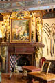 Fireplace with carvings & painting in arms room at Cheverny Chateau. Cheverny, France.