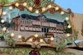 Painting of street car in front of old building in carousel in Jardin Albert 1er, Promenade du Paillon. Nice, France.