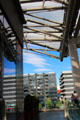 Confluence shopping center & buildings across basin of Saône River. Lyon, France.