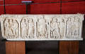 Carved Christ giving scroll of laws to St Peter surrounded by other Apostles on marble sarcophagus at Arles Antiquities Museum. Arles, France.