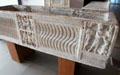Carved Nativity & other biblical scenes on s-shaped strigil pattern on marble sarcophagus at Arles Antiquities Museum. Arles, France.