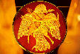 Plate with eagle, deer & snake in Museum of Greek Folk Art in a Mosque built 1759, Athens. Greece.