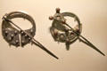 Silver Irish brooches - penannular from Kilkenny & annular from Tipperary at National Museum of Ireland Archaeology. Dublin, Ireland.