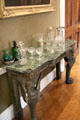 Dining room side table supported on winged lions with glassware at Emo Court. Ireland.