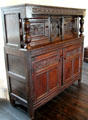 Oak cabinet with turned corner upper posts at Rothe House. Kilkenny, Ireland.