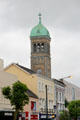 Saints Peter and Paul's church tower over Gladstone Street. Clonmel, Ireland.