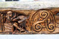 Irish monk recording peace with Vikings detail of Viking sword sculpture by John Hayes near Reginald's Tower. Waterford, Ireland.
