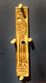 Copper Waterford Lady belt mount at Museum of Treasures. Waterford, Ireland.