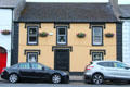 Vintage Main Street building with window & door surrounds. Adare, Ireland.