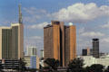 Highrises along Uhuru Park including round conference center in Nairobi. Kenya.