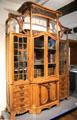 Walnut & oak bookcase in Art Nouveau style at National Museum of History & Art. Luxembourg, Luxembourg.