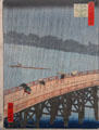 Bridge in the rain woodcut by Utagawa Hiroshige of Japan upon which Vincent van Gogh based a painting at Van Gogh Museum. Amsterdam, NL.