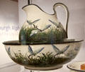 Wemyss ware earthenware dragonfly washbasin & pitcher by Fife Pottery of Gallatown at Edinburgh City Art Centre. Edinburgh, Scotland.