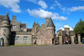 Renaissance-style entrance buildings to Holyrood Palace forecourt which now serve as reception area & Queen's Gallery. Edinburgh, Scotland.
