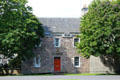 Stone Georgian building on grounds of Holyrood Palace. Edinburgh, Scotland.