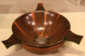 Wooden quaich with three handles with silver coin of Charles II at National Museum of Scotland. Edinburgh, Scotland.