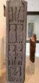 Pictish stone cross shaft carved with Christ, saints & David playing harp from Monifieth at National Museum of Scotland. Edinburgh, Scotland.