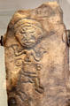 Scottish stone carving of Christian in prayer from Over Kirkhope at National Museum of Scotland. Edinburgh, Scotland.
