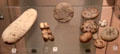 Stone amulets or gaming pieces with Pictish symbols mostly from Burrian at National Museum of Scotland. Edinburgh, Scotland.