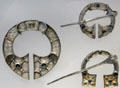 Silver brooches from St Ninian's Isle Treasure found in Shetland church prob. hidden from Vikings at National Museum of Scotland. Edinburgh, Scotland.