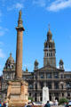 Walter Scott Memorial Column & Glasgow City Chambers in George Square. Glasgow, Scotland.