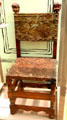 Chair said to be made from tree from which Prince Charles's officers were hanged at battle of Culloden at Kelvingrove Art Gallery. Glasgow, Scotland.