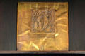 Margaret Macdonald-style brass plaque on dining room sideboard at House for an Art Lover. Glasgow, Scotland.