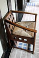Hall armchair with woven seat by C.R. Mackintosh at Hill House. Helensburgh, Scotland.