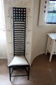 Ladder-back chair by C.R. Mackintosh in main bedroom at Hill House. Helensburgh, Scotland.