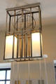 Ceiling lamp by C.R. Mackintosh in main bedroom at Hill House. Helensburgh, Scotland.
