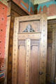 Elaborate Greek-themed door in dining room at Holmwood. Glasgow, Scotland.