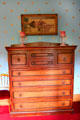 Bedroom chest of drawers with lustres at Holmwood. Glasgow, Scotland.