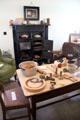 Kitchen with oven & work table in Reid farmhouse at National Museum of Rural Life. Kittochside, Scotland.