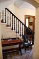 Center hall with stairs in Reid farmhouse at National Museum of Rural Life. Kittochside, Scotland.