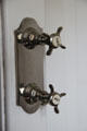 Edwardian shower valves at Lauriston Castle. Edinburgh, Scotland.