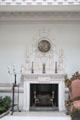 Hall fireplace with Adamesque themes interpreted by John Kinross in Hall at Manderston House. Duns, Scotland.