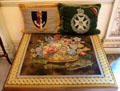 Embroidered cushions & tapestry with Roman Mosaic design by Major Bailie of Manderston at Manderston House. Duns, Scotland.